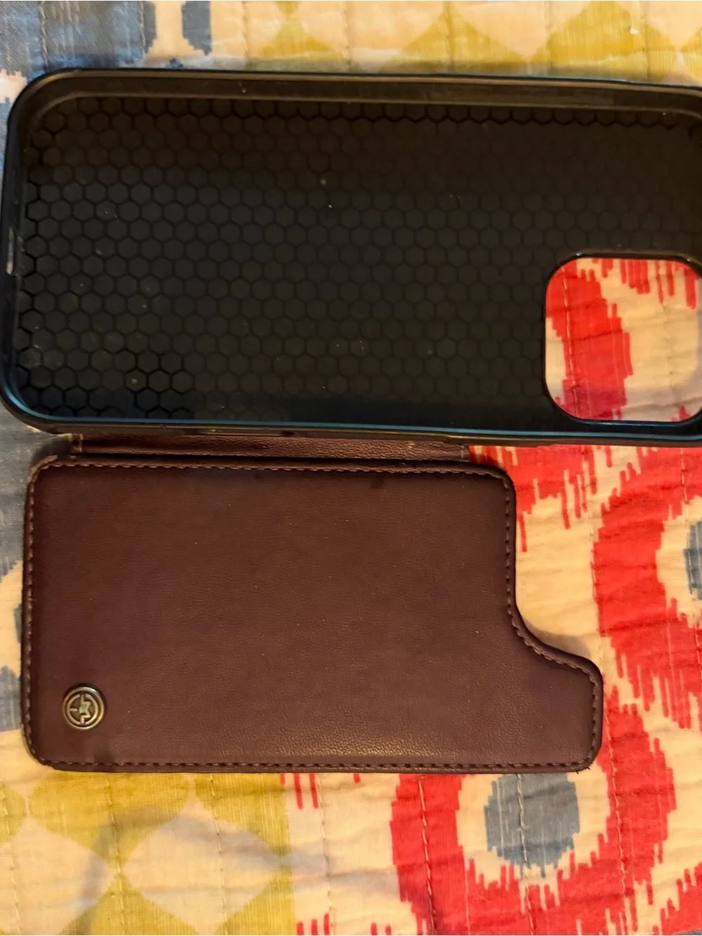 Set of 2 iPhone 16 Pro Max phone cases: one purple Wallet, one black and clear